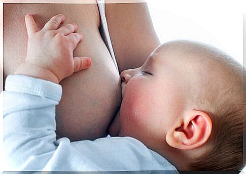 baby taking from the mother's breast