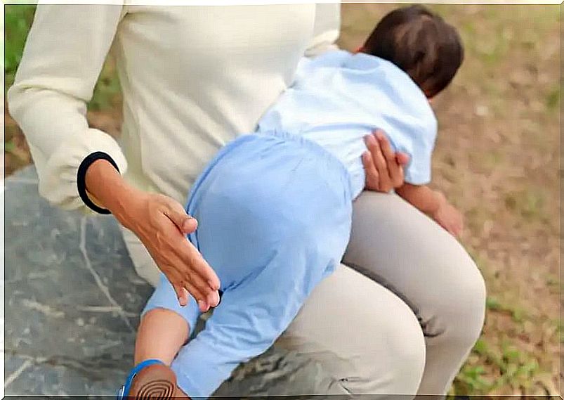 Mother beating her child not knowing how punishments affect children's brains.