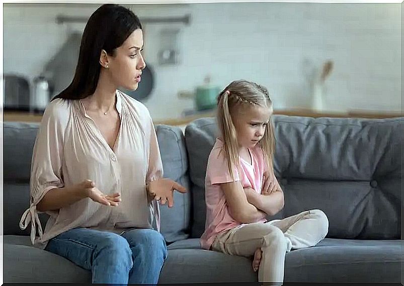 Mother scolding and educating her daughter after her misbehavior.