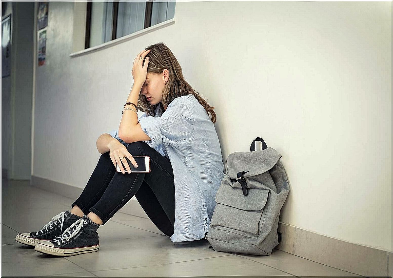 What should a teacher do in the face of school bullying?